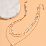 Το σετ κολιέ Trinity Pearl Layer